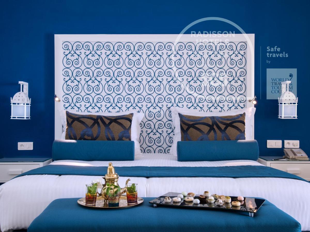 Radisson Blu Resort & Thalasso Hammamet Exteriör bild A bedroom at Radisson Blu Hotel, Marrakech